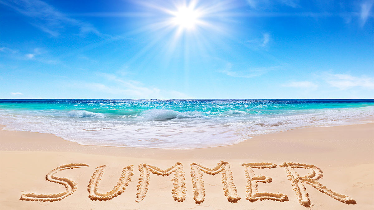 summer estate scritta sulla sabbia